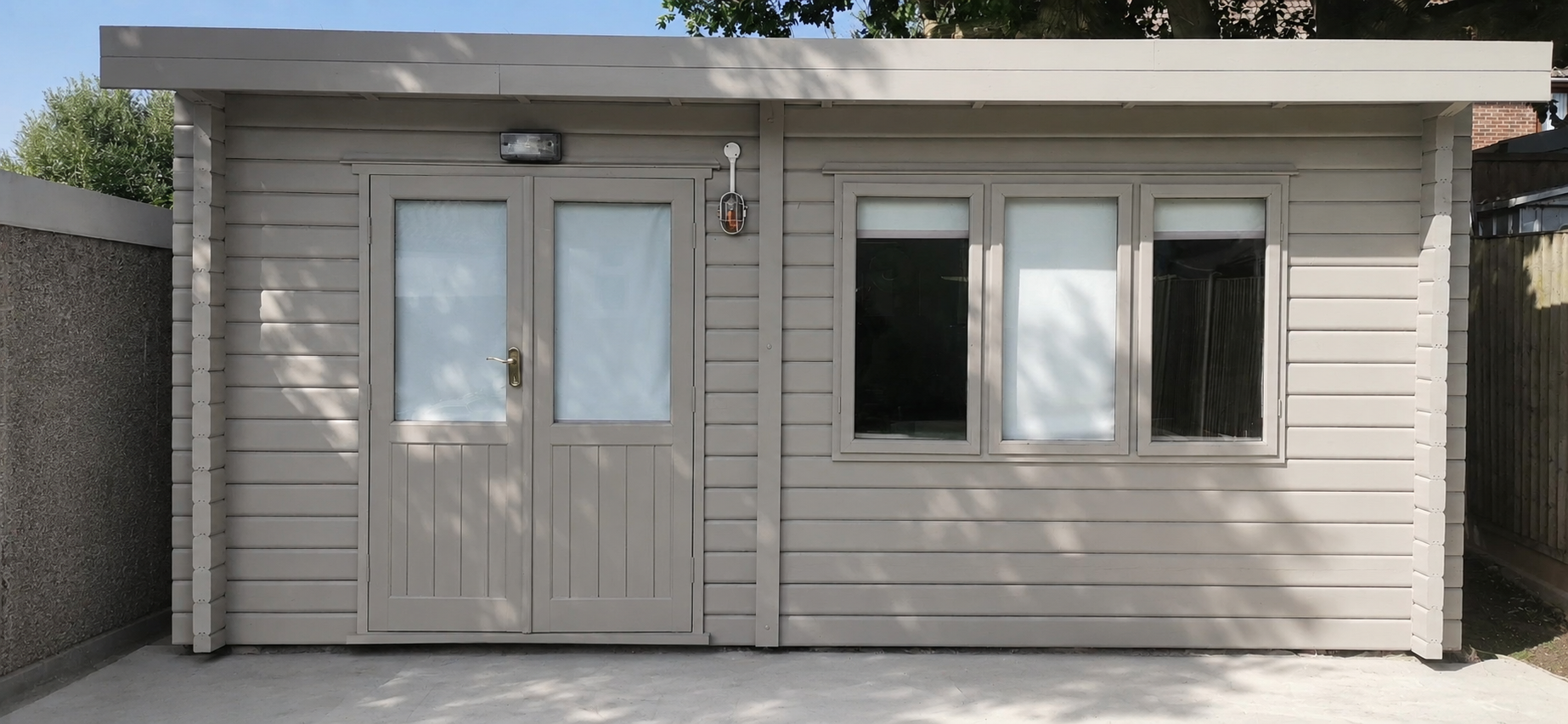 Freshly painted garden room exterior in grey by Essex Decorating Solutions in Basildon, Essex