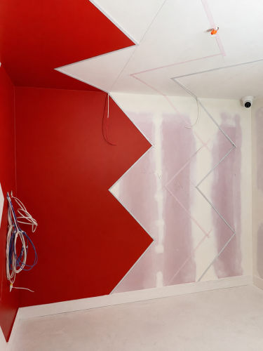 essex-decorating-solutions-red-geometric-feature-wall